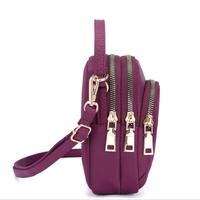 Tas selempang kanvas berlapis poliester wanita dompet panjang penutup ritsleting dekorasi huruf dompet Bahu Messenger