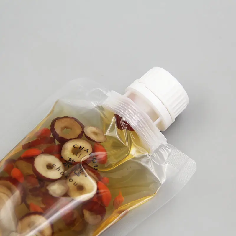 Hot sale BPA transparent plastic drink juice fruit liquid packaging stand up bag spout pouch