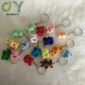 Hot selling mini plastic flocking bear keychain cartoon animal flocked doll