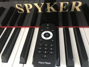 Sistem Piano Pemain Mandiri untuk Piano Digital dan Piano Akustik