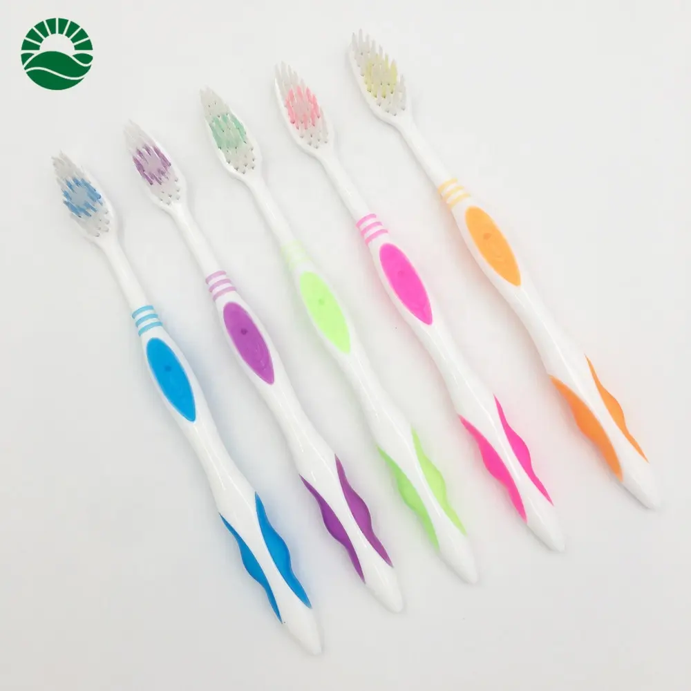 Best selling double color molding Chinese plastic toothbrush for adult