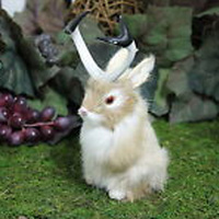 Lapin en fourrure réaliste grandeur nature pour Pâques