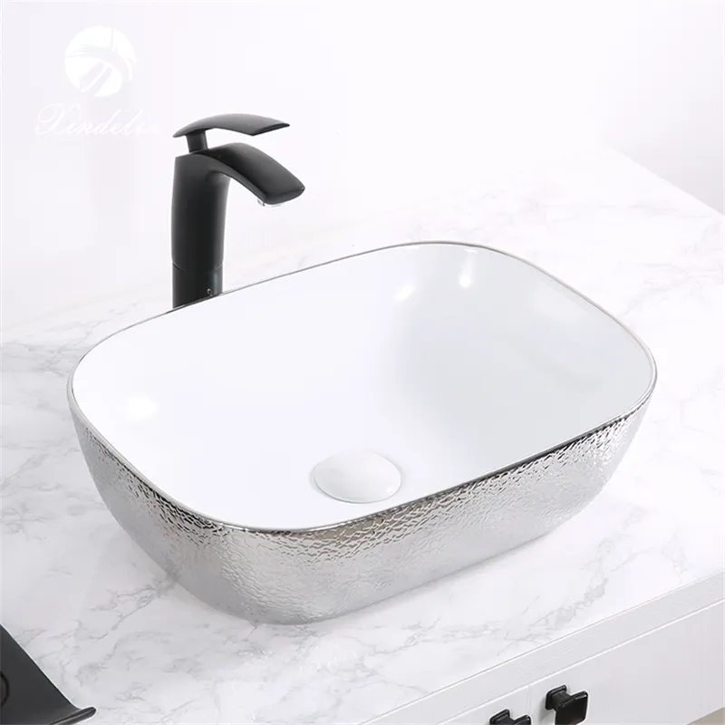 Lavabo de cerámica con diseño gráfico para baño, lavamanos de encimera de cerámica, profesional, electrochapado, blanco y plateado, Moderno