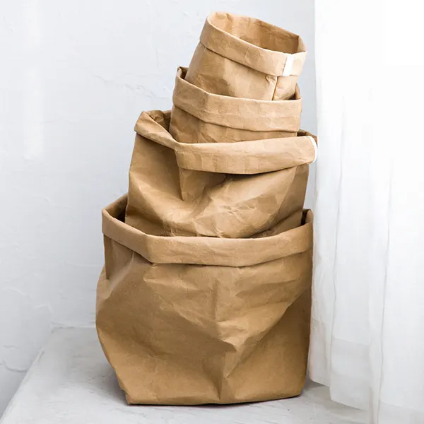 Bolsa de papel resistente al agua con diseño personalizado, bolsa de papel lavable única, proveedor de <span class=keywords><strong>bolsas</strong></span> de papel impermeables al por mayor