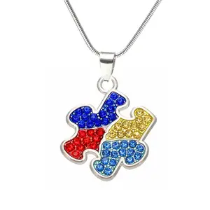 Cristal de moda rompecabezas pieza autismo rompecabezas colgante collar de cadena de serpiente para autista joyas