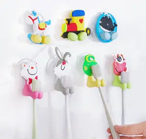 Soporte de pared de plástico para cepillos de dientes con ventosa para niños