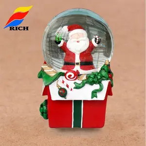 Best selling resin white christmas santa claus snow globe sale