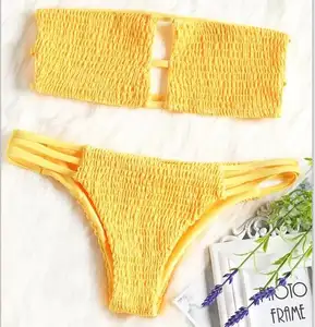 Bandeau màu vàng smocked Áo ngực Bikini với đáy