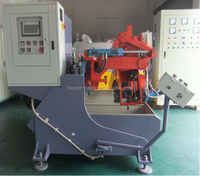 Machine de moulage par gravité pour machines électriques, pour le moulage de la fonte de laiton