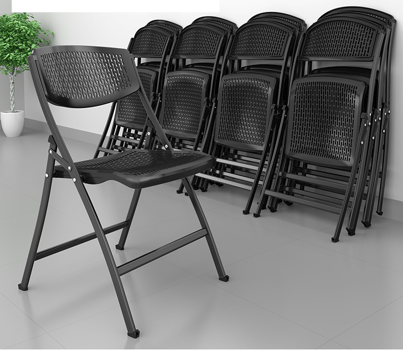 Cheap vented back resin plastic folding study chair with writing pad