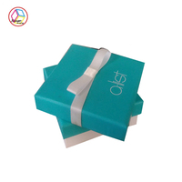 Vente en gros en stock Boîte de rangement pour bijoux avec nœud blanc imperméable de luxe Organisateur de bagues, boucles d'oreilles et colliers en papier de qualité supérieure