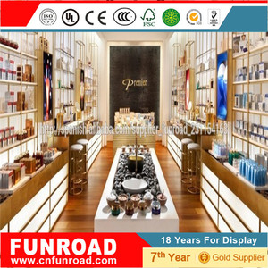 Mostradores expositivos escaparate de pared para tiendas cosmeticas con <span class=keywords><strong>vitrina</strong></span> central y modulos de pared de estilo <span class=keywords><strong>elegante</strong></span> - Product Image 6