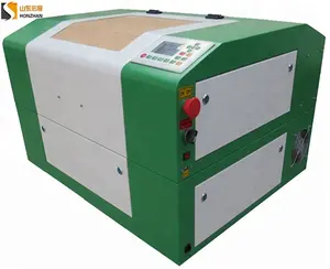 ¡Buena calidad, precio de fábrica! La máquina cortadora de grabado láser CO2 CNC pequeña y vendedora caliente tiene un módulo de enfoque automático motorizado