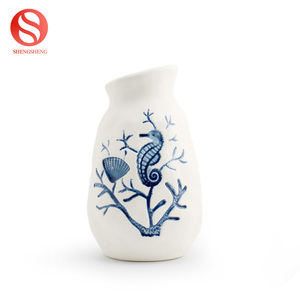 <span class=keywords><strong>Vase</strong></span> <span class=keywords><strong>à</strong></span> fleur en <span class=keywords><strong>porcelaine</strong></span> peint <span class=keywords><strong>à</strong></span> la main de haute qualité <span class=keywords><strong>à</strong></span> motif de coquille de cheval de mer bleu pour la décoration intérieure - Product Image 3