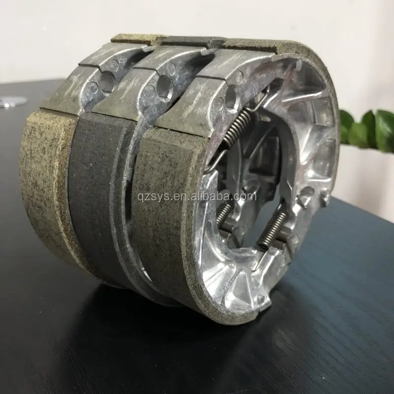 Заводская цена Прямая поставка запчастей для мотоциклов барабанная тормозная колодка YBR125