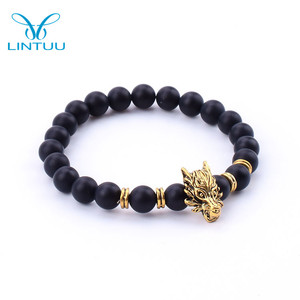 สร้อยข้อมือจี้มังกรจีนสร้างแรงบันดาลใจให้กับจักรราศีสร้อยข้อมือจักรราศีทำจากโลหะผสมทางเรขาคณิตชาติพันธุ์พร้อมโอนิกซ์สำหรับวันครบรอบ