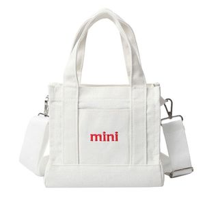 <span class=keywords><strong>Sac</strong></span> à main en toile avec poignée en <span class=keywords><strong>cuir</strong></span>, prix bas, tendance, <span class=keywords><strong>sac</strong></span> fourre-tout pour femmes, avec bandoulière, sacs de voyage, logo personnalisé - Product Image 1