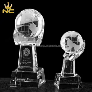 Crystal World In Hands Trophy Clear Glass Ball World Globe Award With Custom Logo