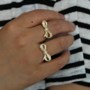 Chapado en oro precioso joven damas joyería micro pave cz lindo moño adorable moda anillo de dedo anillos fotos