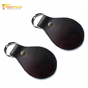 व्यक्तिगत भूरे चमड़े 13.56mhz Fm11r08 1k बाइट RFid <span class=keywords><strong>Nfc</strong></span> Keyfob टैग