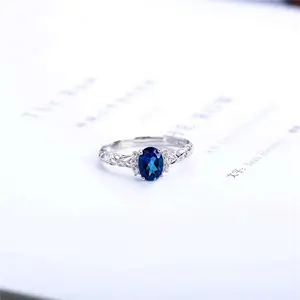 China edelsteen fabriek groothandel sieraden 925 sterling zilver goud plating elegante blauwe natuurlijke topaas ring voor vrouwen