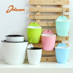 Personalizado precio al por mayor <span class=keywords><strong>de</strong></span> <span class=keywords><strong>la</strong></span> fábrica fabricación auto riego colgante Flor <span class=keywords><strong>de</strong></span> pared plantador <span class=keywords><strong>de</strong></span> hierba - Product Image 4