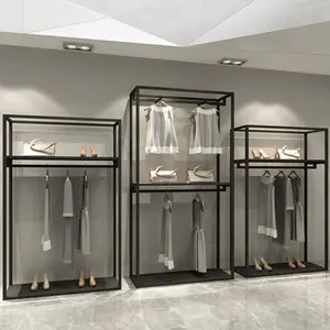 XINJI High End butik giyim mağazası duvara monte raflar moda basit siyah Metal giyim perakende vitrin rafı