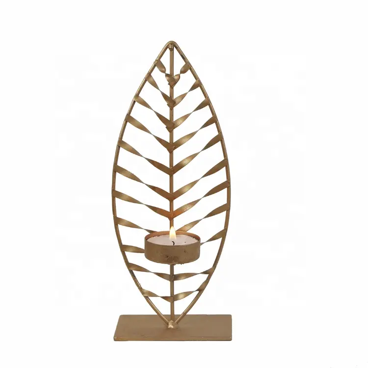 Tabletop gold metal candle holder in the shape of leaf with a tealight cup for home decoration