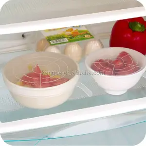 Ultra Stretchy Silicone Super Stretch Lids to keep food fresh. Locks in freshness air tight - Adjusts to shape and size of con