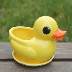 Attraktiver Desktop-Dekor gelbe Enten form Tier Keramik Pflanzer