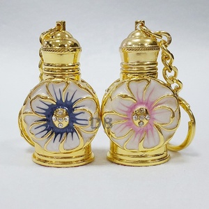 ขวดน้ำหอมโลหะผสมขนาด 3 มล. พร้อมพวง<span class=keywords><strong>กุญแจ</strong></span>รูป<span class=keywords><strong>ดอก</strong></span>ไม้ ผีเสื้อ เปลือกหอย ขวดน้ำมันหอมระเหยแบบพกพาขนาดเล็ก ขวดแก้วแบบเติมได้ - Product Image 3