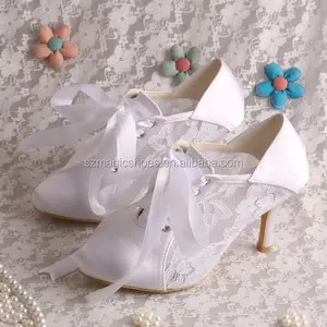 Wedopus complaciente zapatos de boda de blanco encaje