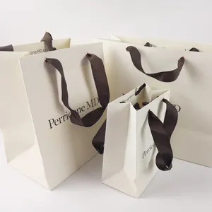 Custom Luxury Bouquet Clothing Shopping Retail Paper Bags With Soft Touch Lamination