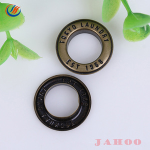 कपड़ों के लिए फैक्टरी कस्टम उत्कीर्ण लोगो पीतल Eyelets