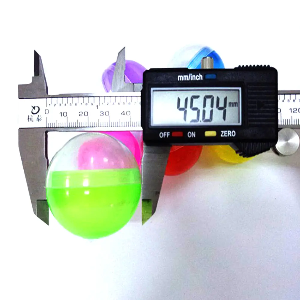 ZQX02ขายส่งลูกอมของขวัญแคปซูลของเล่นบิดเปลือกไข่สำหรับไข่เครื่องหยอดเหรียญ