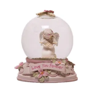 Love you forever angel snow globe holding baby baptism souvenir