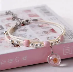 beautiful metal bead and beige rope bracelet bangle woman with glass charm