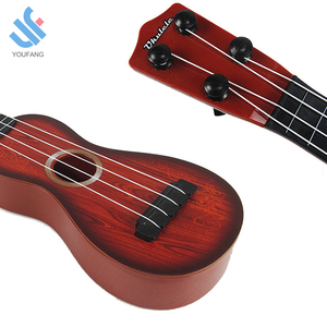 YF-C0105 Prima educazione intelligente di alta qualità per bambini strumento musicale <span class=keywords><strong>mini</strong></span> quattro dazzle chitarra giocattoli - Product Image 3