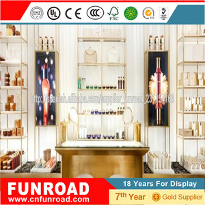 Mostradores expositivos escaparate de pared para tiendas cosmeticas con <span class=keywords><strong>vitrina</strong></span> central y modulos de pared de estilo <span class=keywords><strong>elegante</strong></span> - Product Image 3