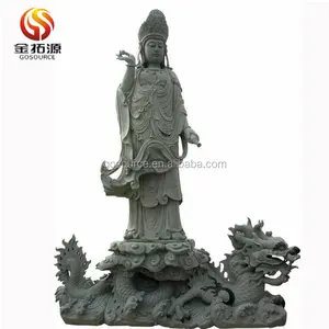 Статуя kuan yin на драконе