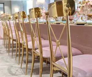 Cojín de terciopelo rosa con espalda cruzada dorada, silla de acero inoxidable para banquete, boda, suministro de fabricación de 10 años