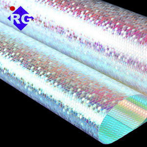 <span class=keywords><strong>Film</strong></span> Dichroic <span class=keywords><strong>PVC</strong></span> Reflektif Transparan Warna Emas Biru untuk Membuat Tas dan Kain - Product Image 1