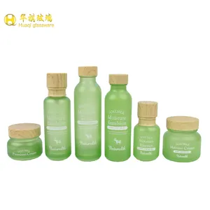 120ml matte green cosmetic glass bottle with wood spray