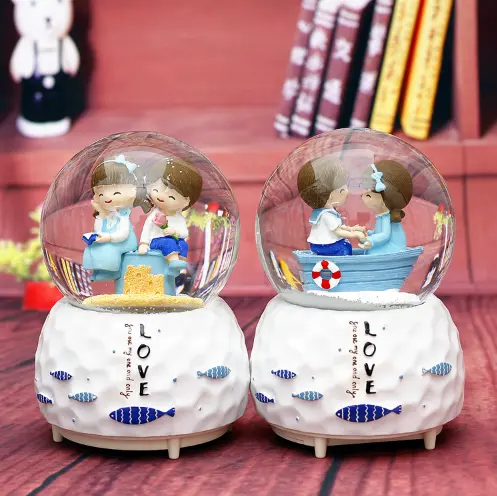 Hot Sell 80/100mm Mediterranean Lovers Snow Globe Music Box with Light and Snow Pump Students Crystal Ball for Decoration