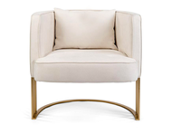 Fauteuil simple en métal doré avec coussin blanc de loisirs