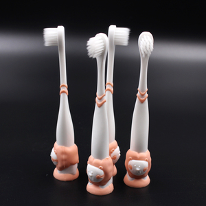 Nouvelle brosse à dents électrique vibrante pour enfants bon marché avec dessin animé brosse à dents pour enfants avec aspiration debout