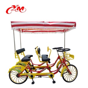 Vélos Surrey à <span class=keywords><strong>4</strong></span> roues pour <span class=keywords><strong>4</strong></span> personnes, vélos <span class=keywords><strong>tandem</strong></span> à cadre en acier/vélos à pédales pour deux personnes/vélo <span class=keywords><strong>4</strong></span> <span class=keywords><strong>places</strong></span> - Product Image 1