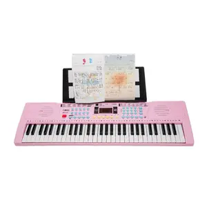 Vente en gros de jouets de piano électrique à 61 touches, instrument de musique pour enfants avec microphone et ligne de chargement USB, jouets pour clavier