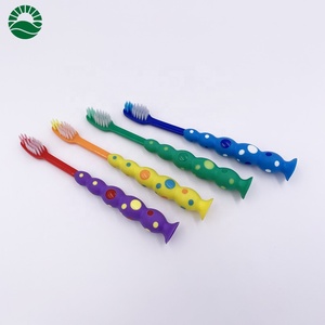 Cepillo de dientes con forma de palos para niños, con tomates clásicos y ventosas - Product Image 3
