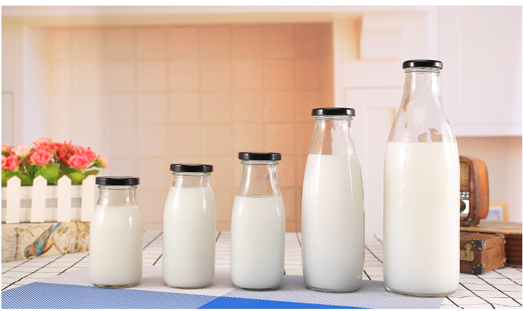 Haonao customized capacity clear small glass milk bottle with metal screw lid